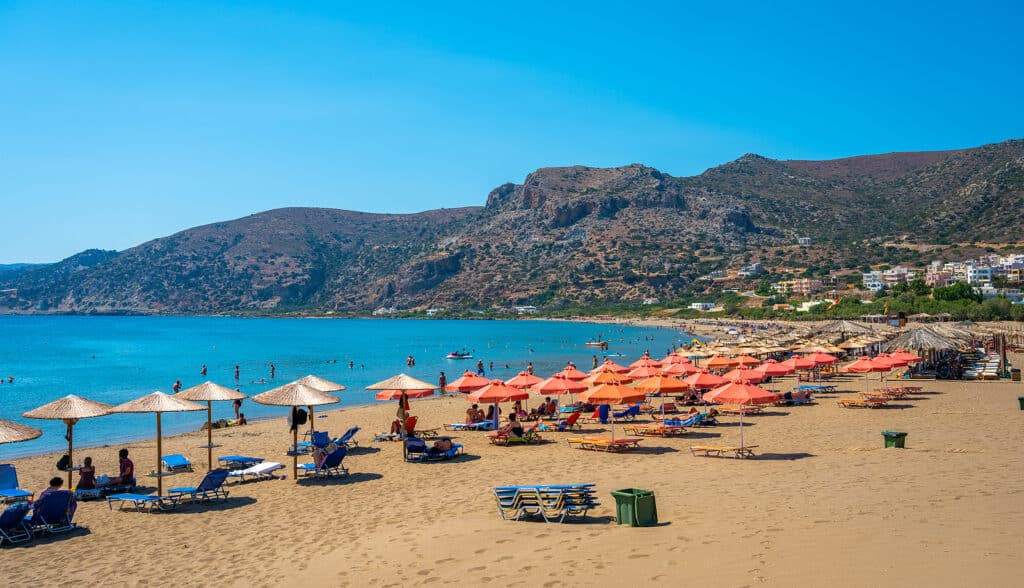 View of traditional greek village and beach Paleochora, Crete, Greece. Scenic panoramic picture of Paleochora village and beach in island Crete, Greece.